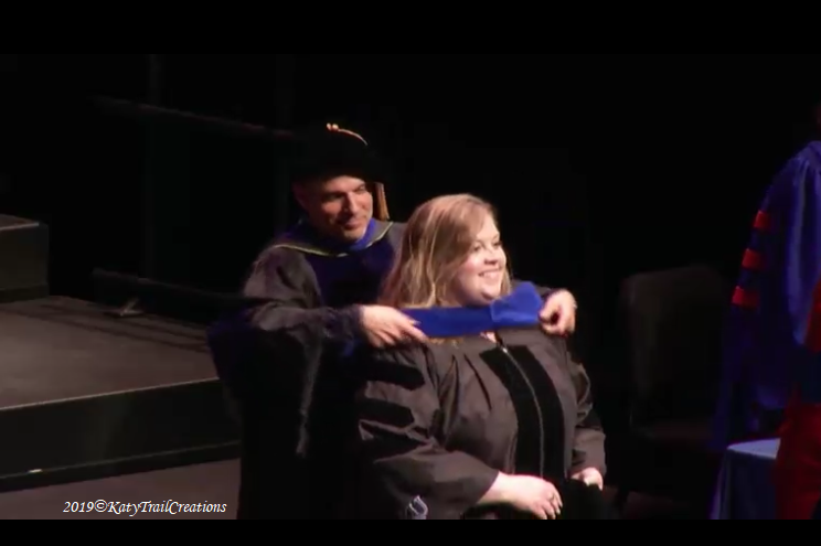 The hooding of Dr. Alex at the University of Kansas, May 18, 2019
