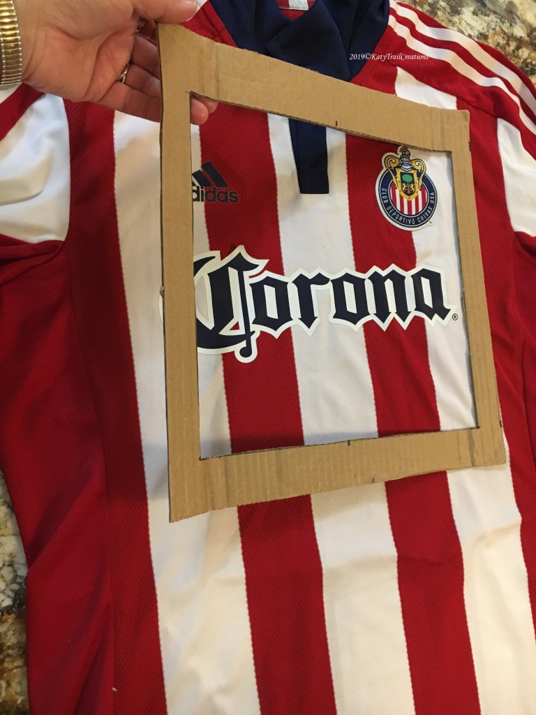 Cardboard template with center point marked